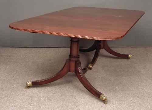 Appraisal: A mahogany twin pedestal dining table of Georgian design with