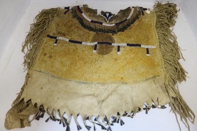 Appraisal: LATE TH C APACHE GIRL'S CAPE WITH BLUE BEADS TIN