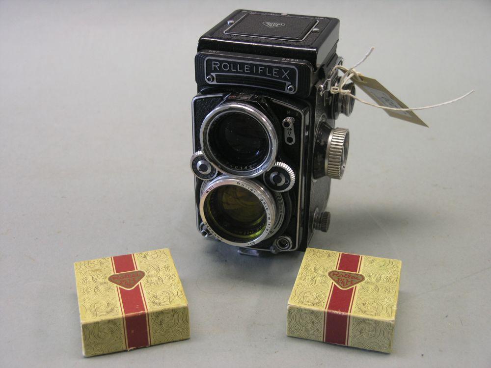 Appraisal: A Rolleiflex twin lens camera Planar mm lens complete with