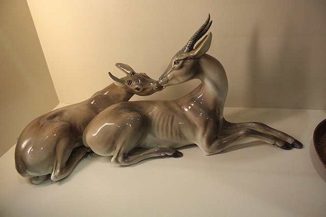 Appraisal: AN ITALIAN PORCELAIN FIGURE GROUP of a pair of antelopes