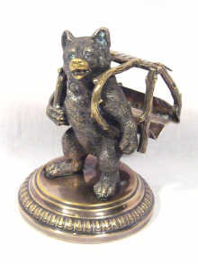 Appraisal: A Polish silver plated bronze model of a bear stamped