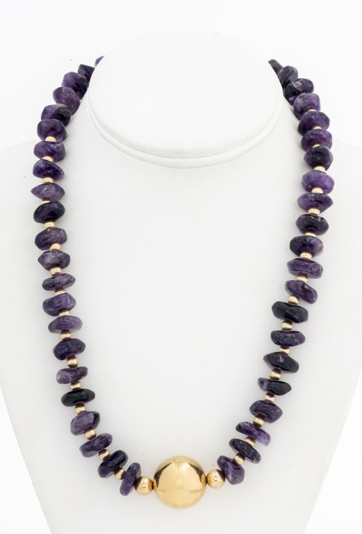 Appraisal: VINTAGE GOLD-TONE TUMBLED AMETHYST BEAD NECKLACE Vintage gold-tone tumbled amethyst