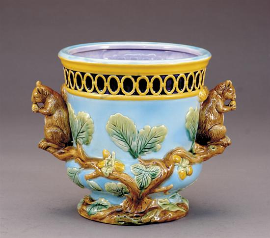 Appraisal: Majolica cachepot decorated in leaf-and-vine design with swirl handles on