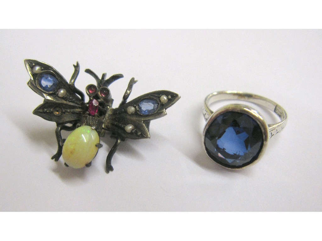 Appraisal: White metal winged insect brooch set with sapphires rubies opal