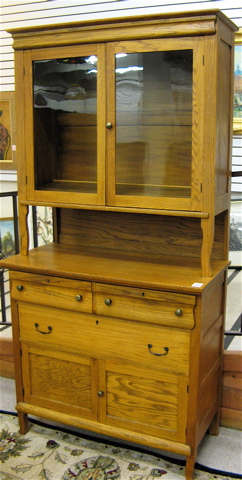 Appraisal: GOLDEN OAK SIDEBOARD American c in two sections top section