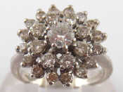 Appraisal: An carat white gold diamond cluster ring the central round