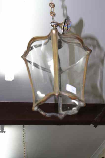 Appraisal: A BRASS FOUR SIDED TAPERING HALL LANTERN with serpentine sides