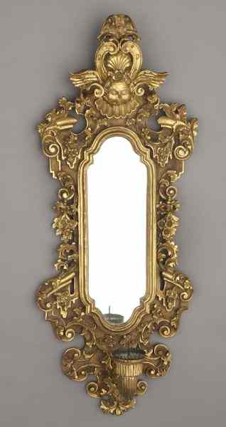 Appraisal: Italian carved gilt wood girandole mirror the top surmounted by