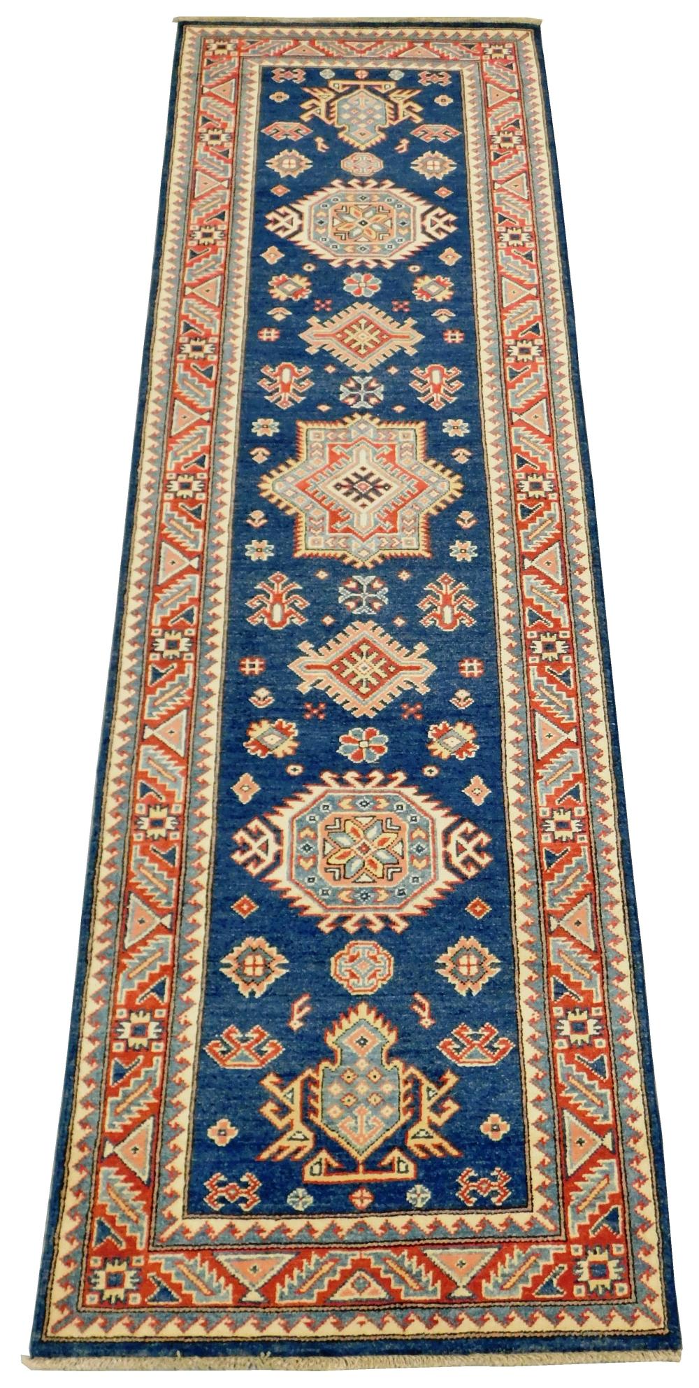 Appraisal: RUG Uzbek Kazak runner ' x ' ocean blue field