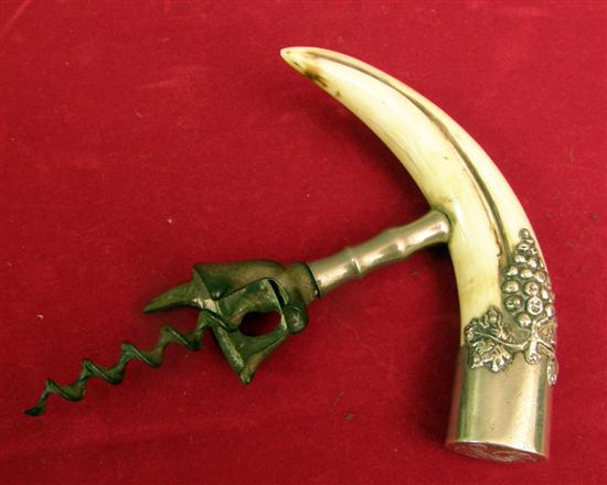 Appraisal: th century horn white metal handled corkscrew the handle stamped