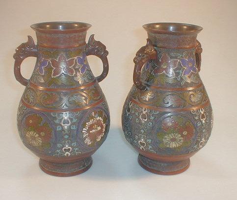 Appraisal: A pair of Far Eastern bronzed metal baluster vases with