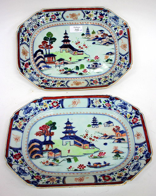 Appraisal: A PAIR OF CANTON PORCELAIN OCTAGONAL PLATES decorated with buildings