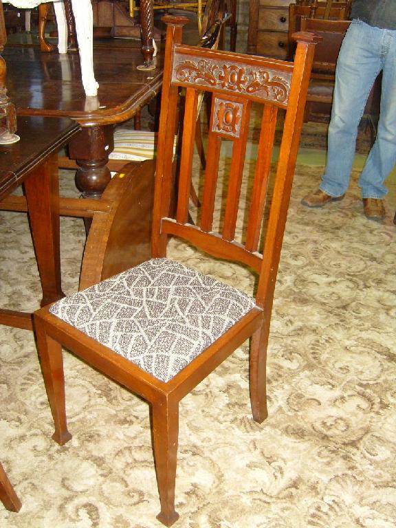 Appraisal: A set of four Edwardian walnut high back dining chairs