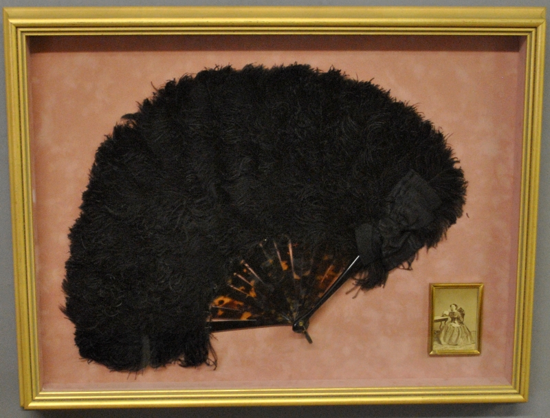 Appraisal: - Shadow box framed black feather fan with a photo