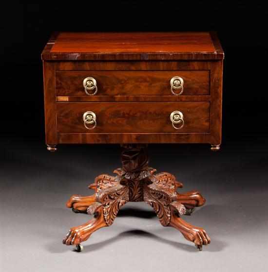 Appraisal: American Classical banded mahogany two-drawer worktable with carved pedestal and