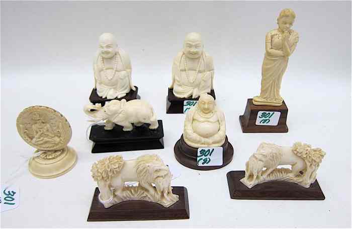 Appraisal: EIGHT HAND CARVED ELEPHANT IVORY FIGURES three Buddhas seated height