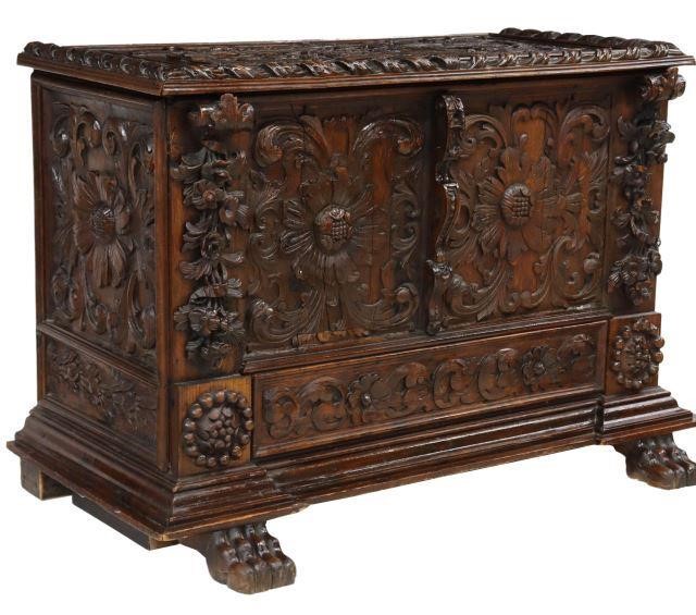 Appraisal: Continental carved oak chest with running coin ribbon twist molding