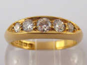 Appraisal: An antique carat gold five stone diamond ring the round