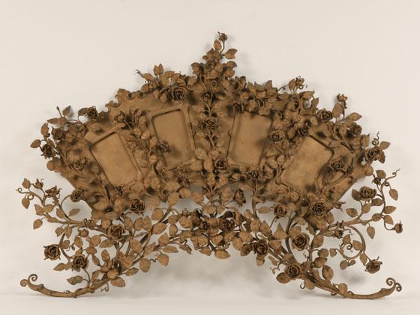 Appraisal: Incredibly ornate gilt metal hanging picture frame arched floral vining