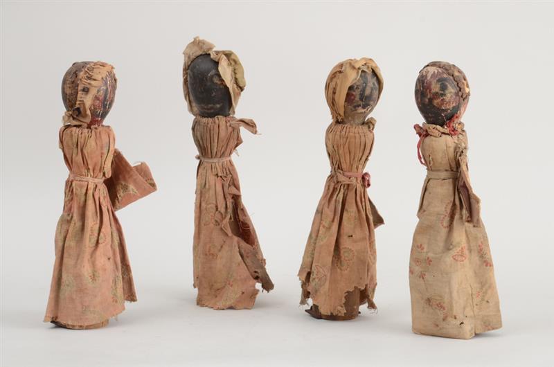 Appraisal: GROUP OF FOUR AFRICAN CLOTH AND WOOD DOLLS Each simply