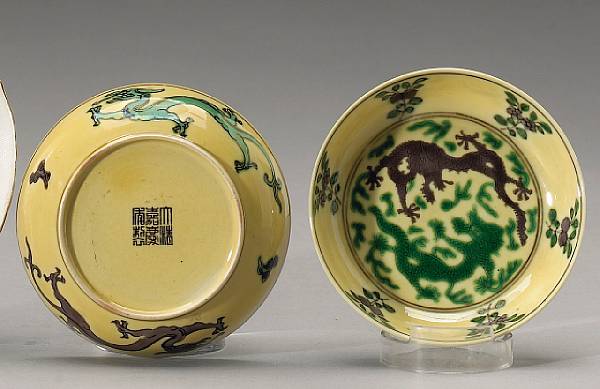 Appraisal: A pair of three-color glazed porcelain deep saucer dishes Jiaqing