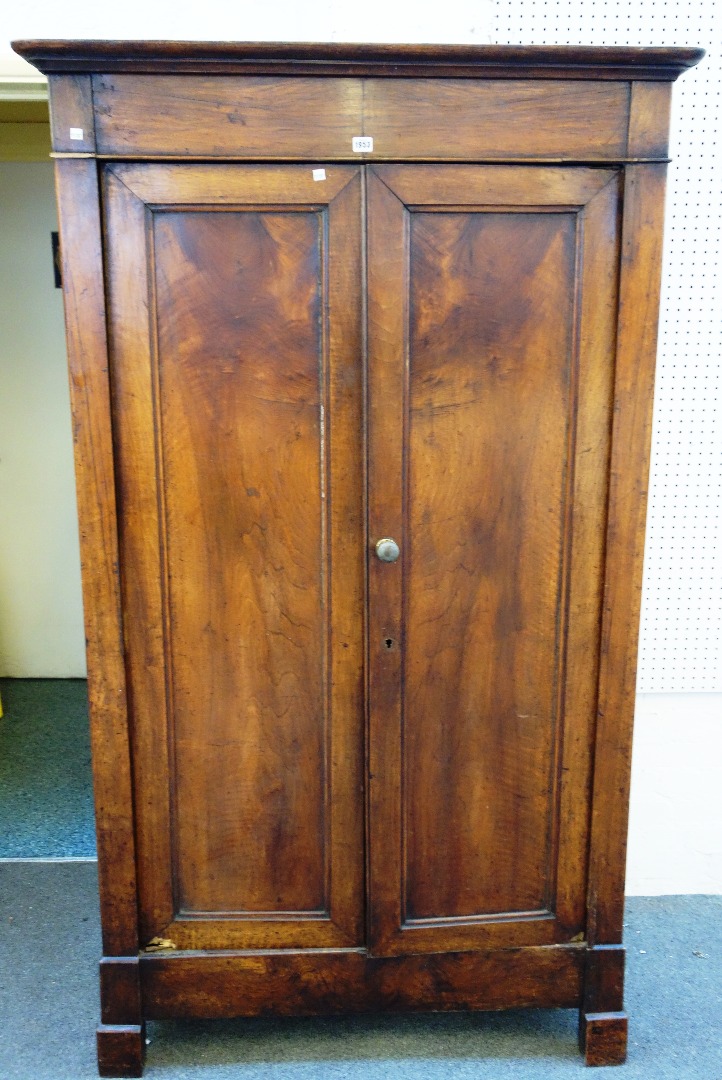 Appraisal: A th century French walnut two door wardrobe on block