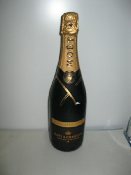 Appraisal: A BOTTLE OF MOET CHANDON GRAND VINTAGE CHAMPAGNE ML A