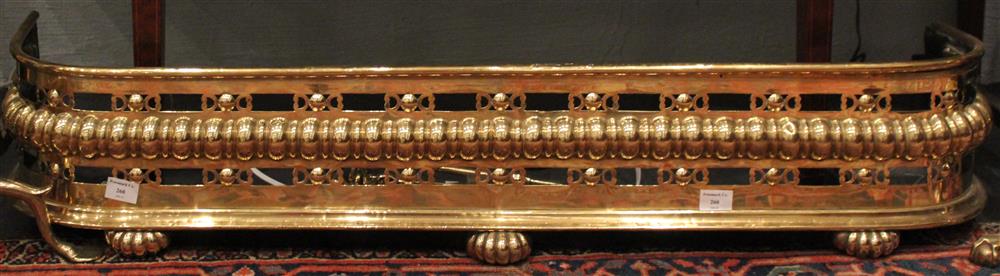 Appraisal: ENGLISH REGENCY BRASS FIREPLACE FENDER WITH TOOLS ca having a