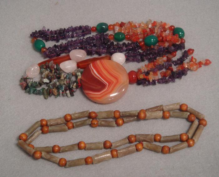 Appraisal: multi colored Chinese stone necklaces agate amethyst amber other stones