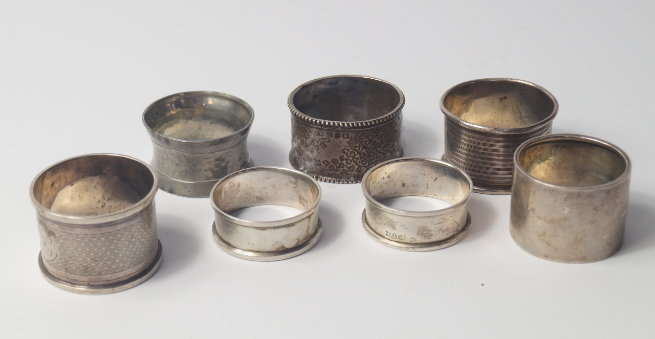 Appraisal: Six Victorian and later silver napkin rings one with engraved