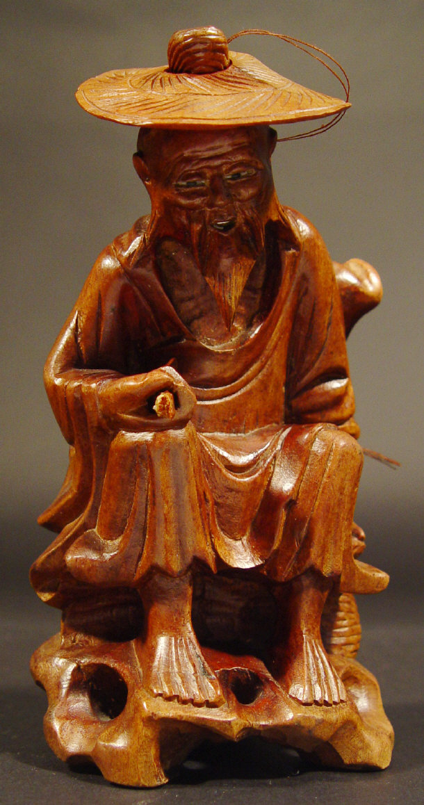 Appraisal: Chinese hardwood figure of an elder cm high