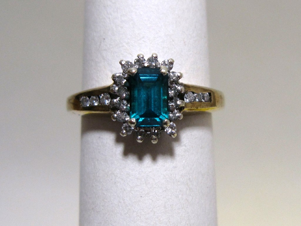 Appraisal: Nine carat gold diamond and gem set cluster ring with