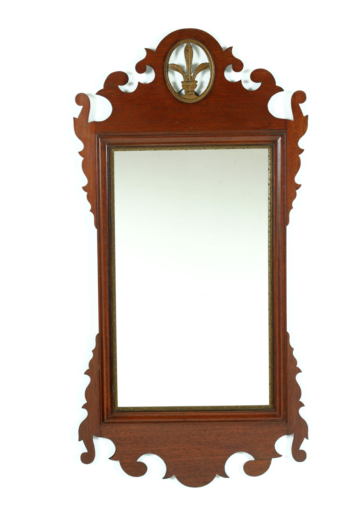 Appraisal: CHIPPENDALE MIRROR England th- th century mahogany Scroll-cut mirror with