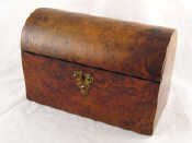 Appraisal: A Victorian walnut veneered domed casket c x x cm