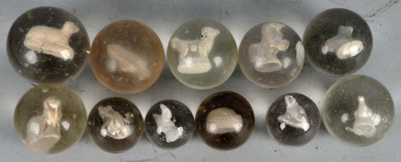 Appraisal: Lot of Sulphide Marbles Description Includes a fish rearing horse