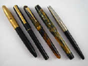 Appraisal: A Sheaffer pen together with four various pens including a