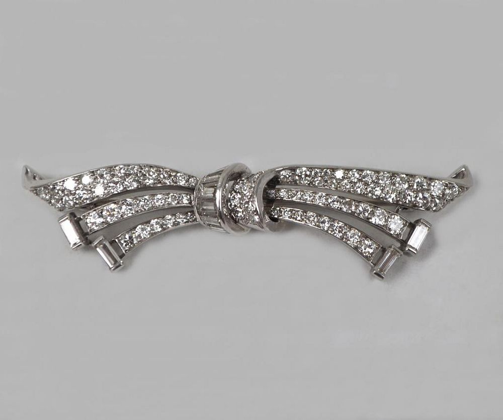 Appraisal: Platinum Diamond Art Deco Bow Pin with eighty-five pave diamonds