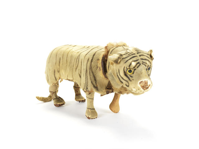 Appraisal: A Roullet Decamps clockwork pouncing Tiger The skin covered tiger