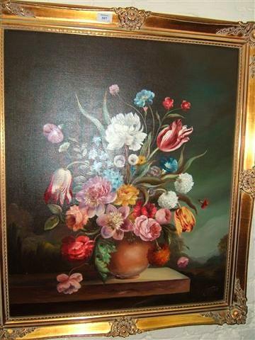 Appraisal: A pair of European School still life paintings of flowers