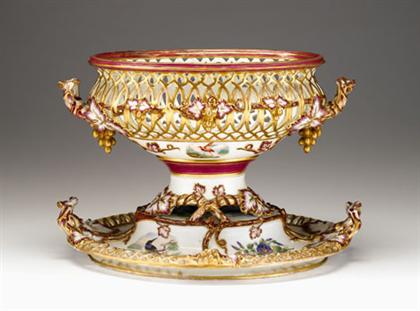 Appraisal: Large reticulated French porcelain centerpiece late th century In two