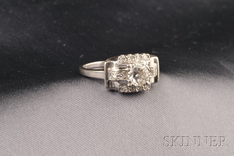 Appraisal: Platinum and Diamond Ring prong-set with a full-cut diamond further