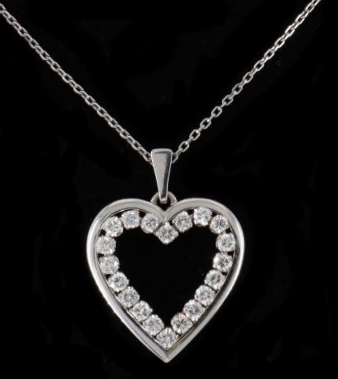 Appraisal: Estate kt white gold heart-shaped pendant with twenty round brilliant