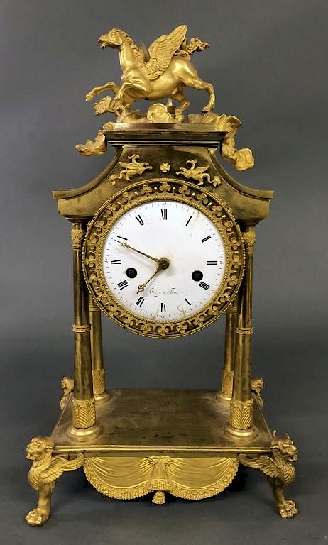 Appraisal: French Brass Pegasus Clock French brass clock signed on porcelain