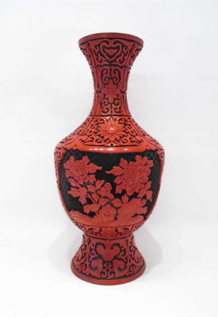 Appraisal: CHINESE CINNABAR STYLE VASE with red over black floral motif