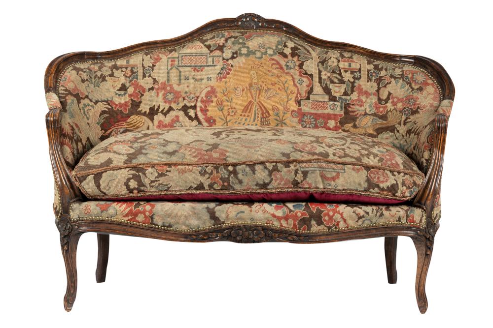 Appraisal: LOUIS XV STYLE WALNUT CANAPEwith needlepoint upholstery and down-filled seat