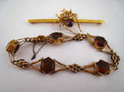 Appraisal: A carat gold gate bracelet set with citrines together with