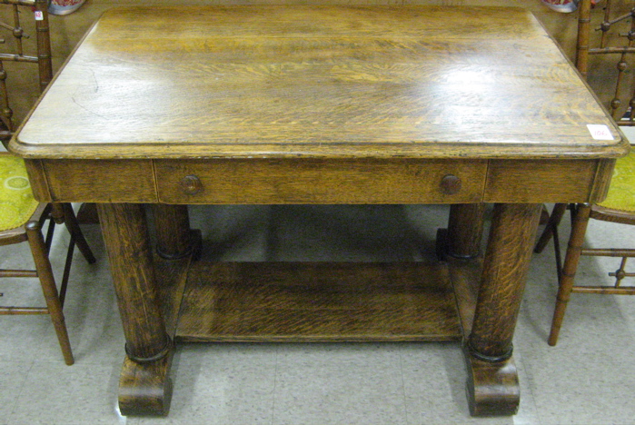 Appraisal: AN OAK LIBRARY TABLE Empire Revival design American c having