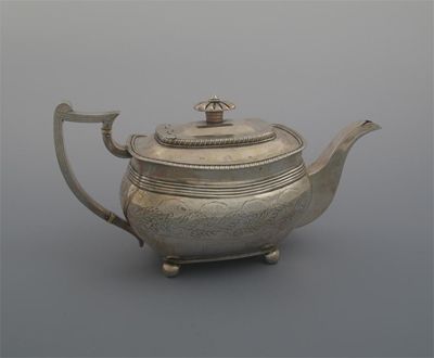 Appraisal: A George III large shaped teapot with ball feet with