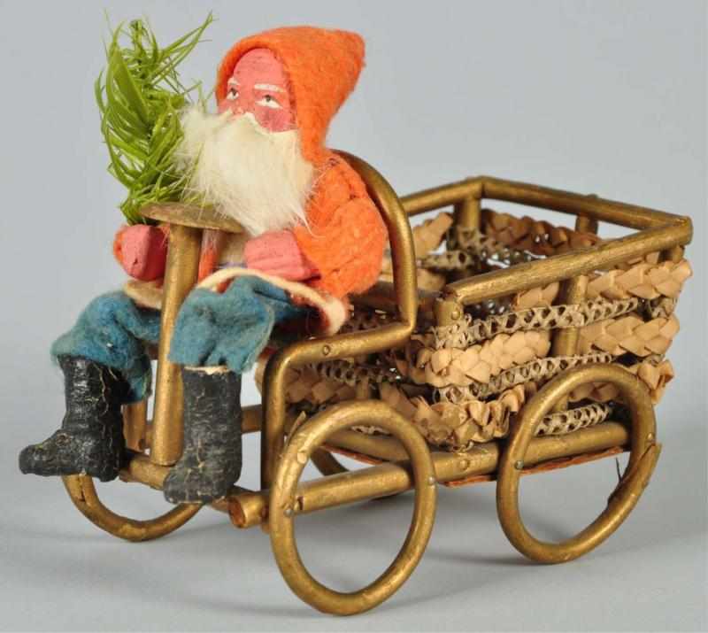 Appraisal: Rare Wicker Wood Santa-Driven Automobile Description German Santa is holding