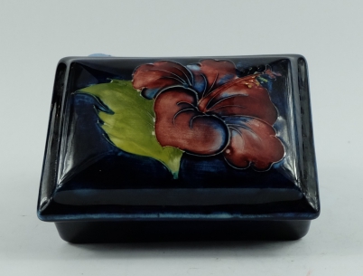 Appraisal: Moorcroft oblong box cover decorated in the hibiscus design